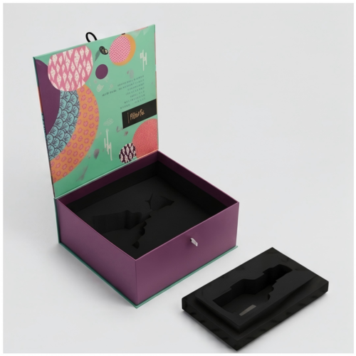 Custom Art Print Magnetic Box open with custom shaped black foam bottle insert